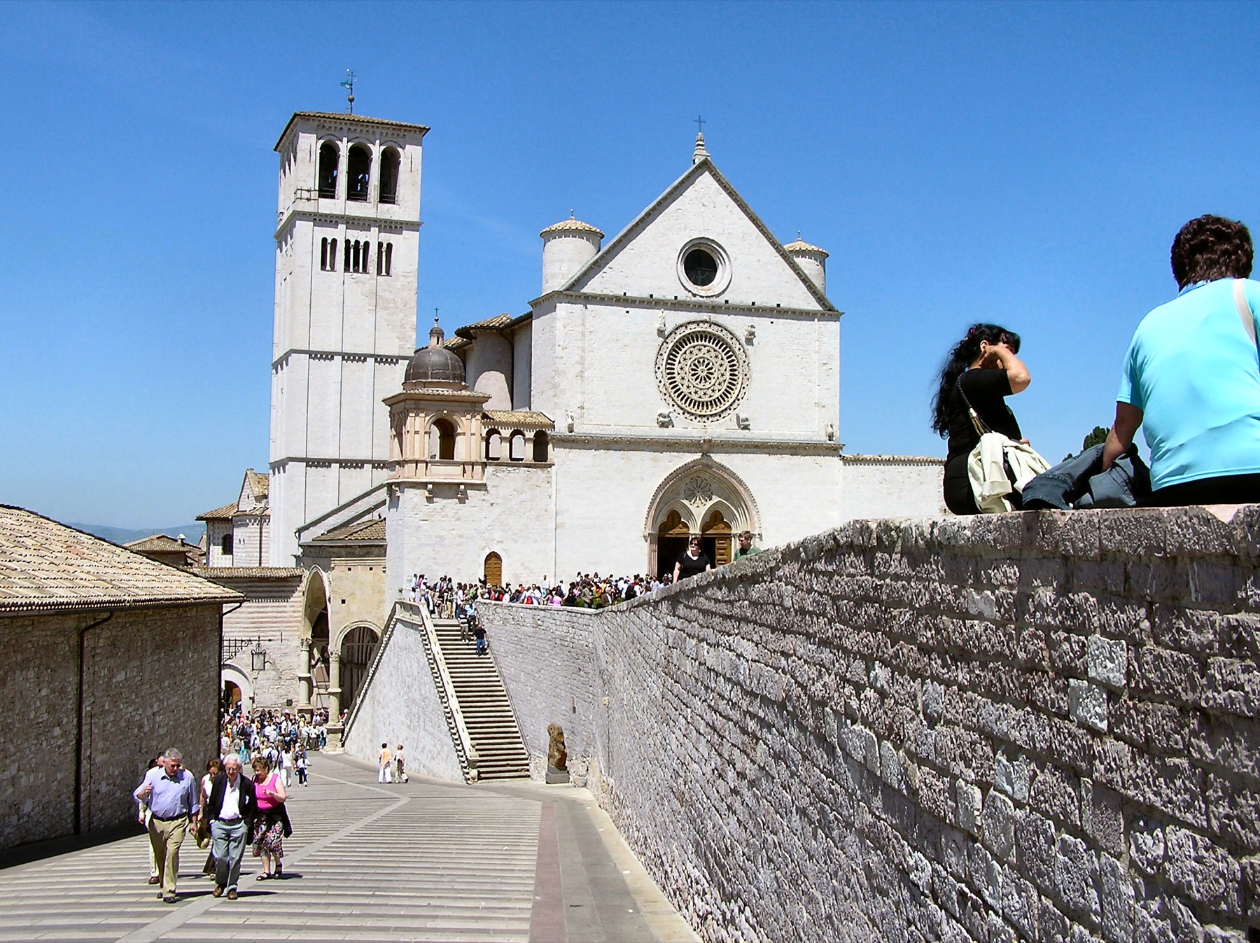 Basilica of Saint Francis of Assisi seen from the stone approach under a clear sky