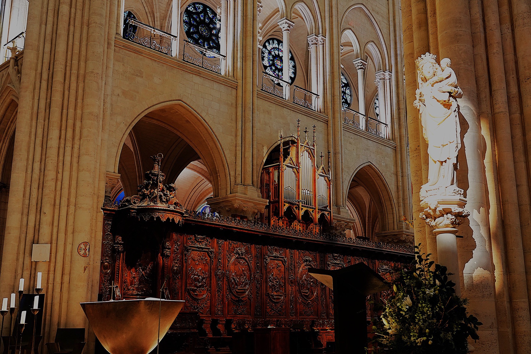 The statue of Notre-Dame de Paris, the Virgin and Child, inside the restored cathedral in December 2024.