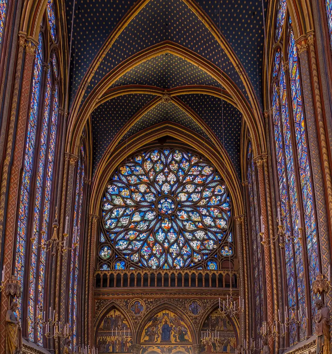 Panoramic view of the upper chapel of the Sainte-Chapelle with its tall stained-glass lancet windows