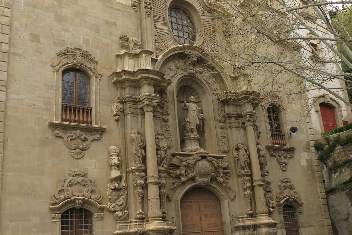 The Baroque facade of the Cova de Sant Ignasi sanctuary at Manresa, with the statue of Saint Ignatius.