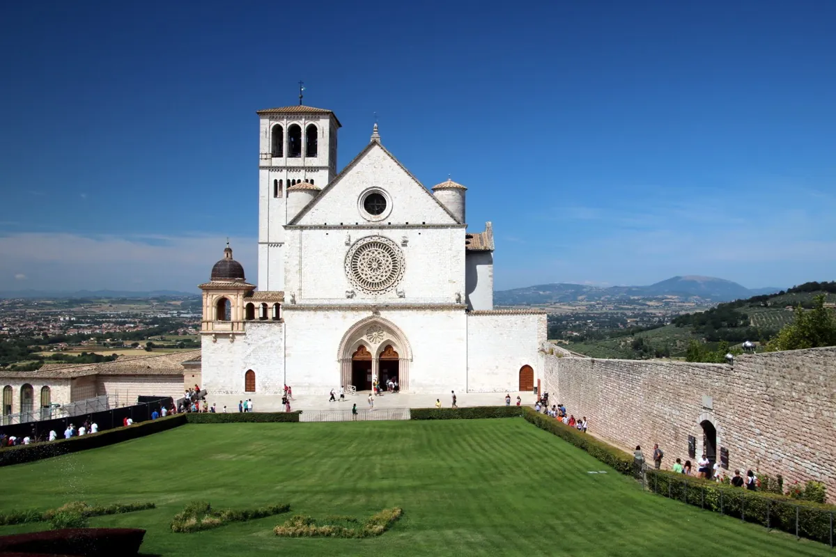 The Basilica of Saint Francis rising above the Umbrian countryside at Assisi.