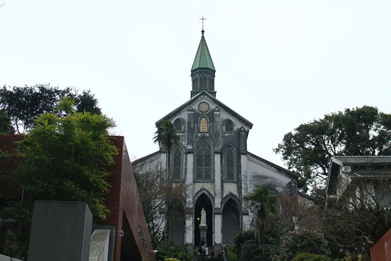The white west front of Ōura Cathedral, with the statue of Our Lady in the niche above the central door.