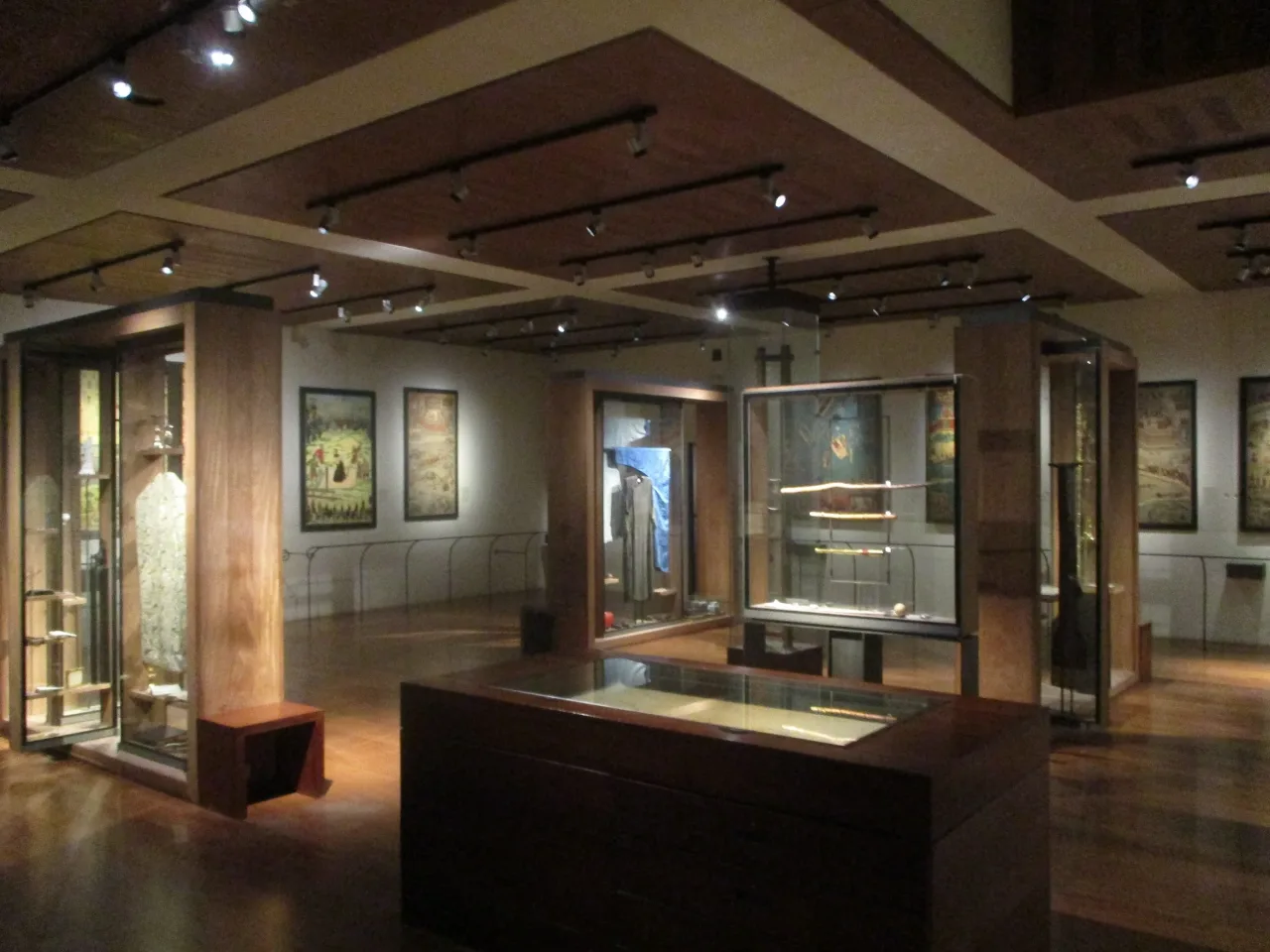 The full length of the Paris Foreign Missions Martyrs' Hall, with its display cases, devotional objects, and room depth visible together.