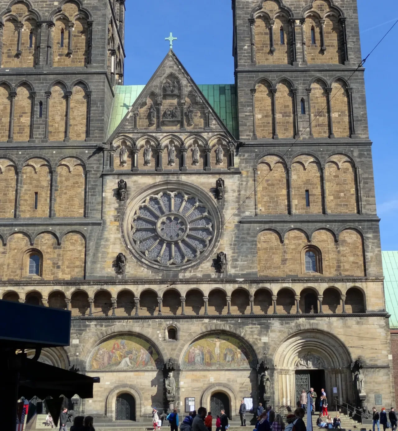 The twin Romanesque towers and west facade of Saint Peter's Cathedral in Bremen.