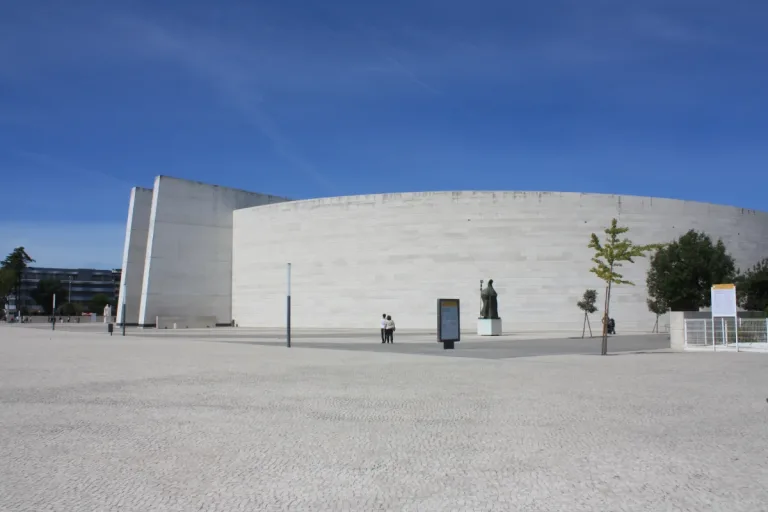 The low modern exterior of the Basilica of the Most Holy Trinity at the south end of the Fátima esplanade.