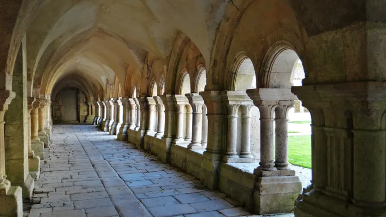 A Romanesque cloister arcade at Fontenay Abbey in Burgundy.