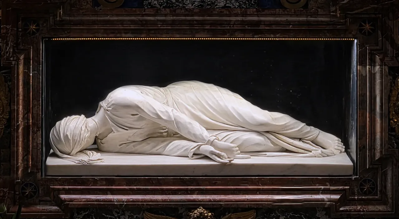 Stefano Maderno's marble sculpture of Saint Cecilia lying beneath the high altar of Santa Cecilia in Trastevere in Rome.