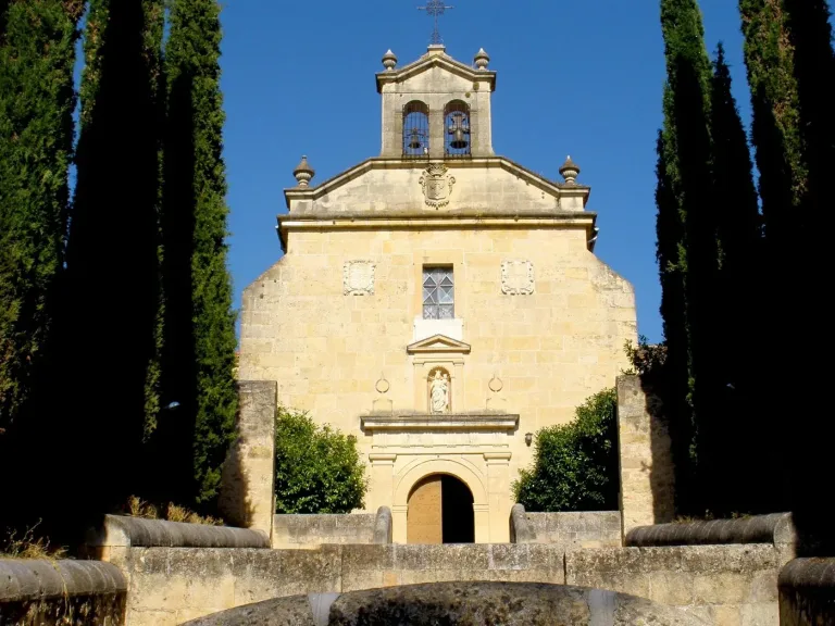 The church of the Convento de los Carmelitas Descalzos at Segovia among its cypresses.