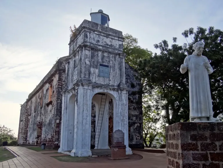 The ruined shell of St. Paul's Church on St. Paul's Hill in Malacca, with the statue of Saint Francis Xavier.